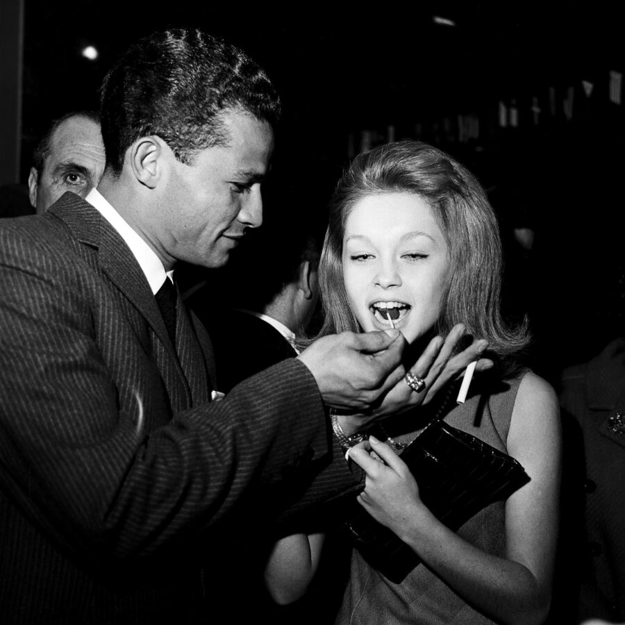 Photographic Social Vision - Marisol y el torero venezolano Curro Girón durante la fiesta de despedida de soltero de éste, en el Hotel Velázquez. Madrid, 1963